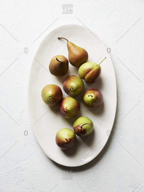 Arrangement of fresh pears on a platter