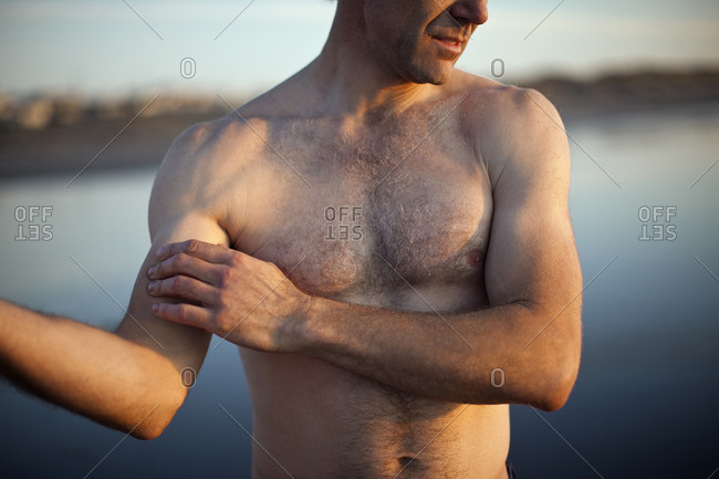 A Man Working On Flexing His Muscles Showing Off His Chest. Stock Photo,  Picture and Royalty Free Image. Image 47750985.
