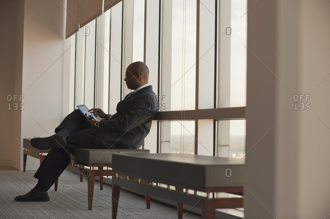 African American businessman using digital tablet