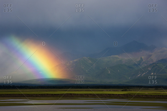 Rainbow over the steppe, Mongolia