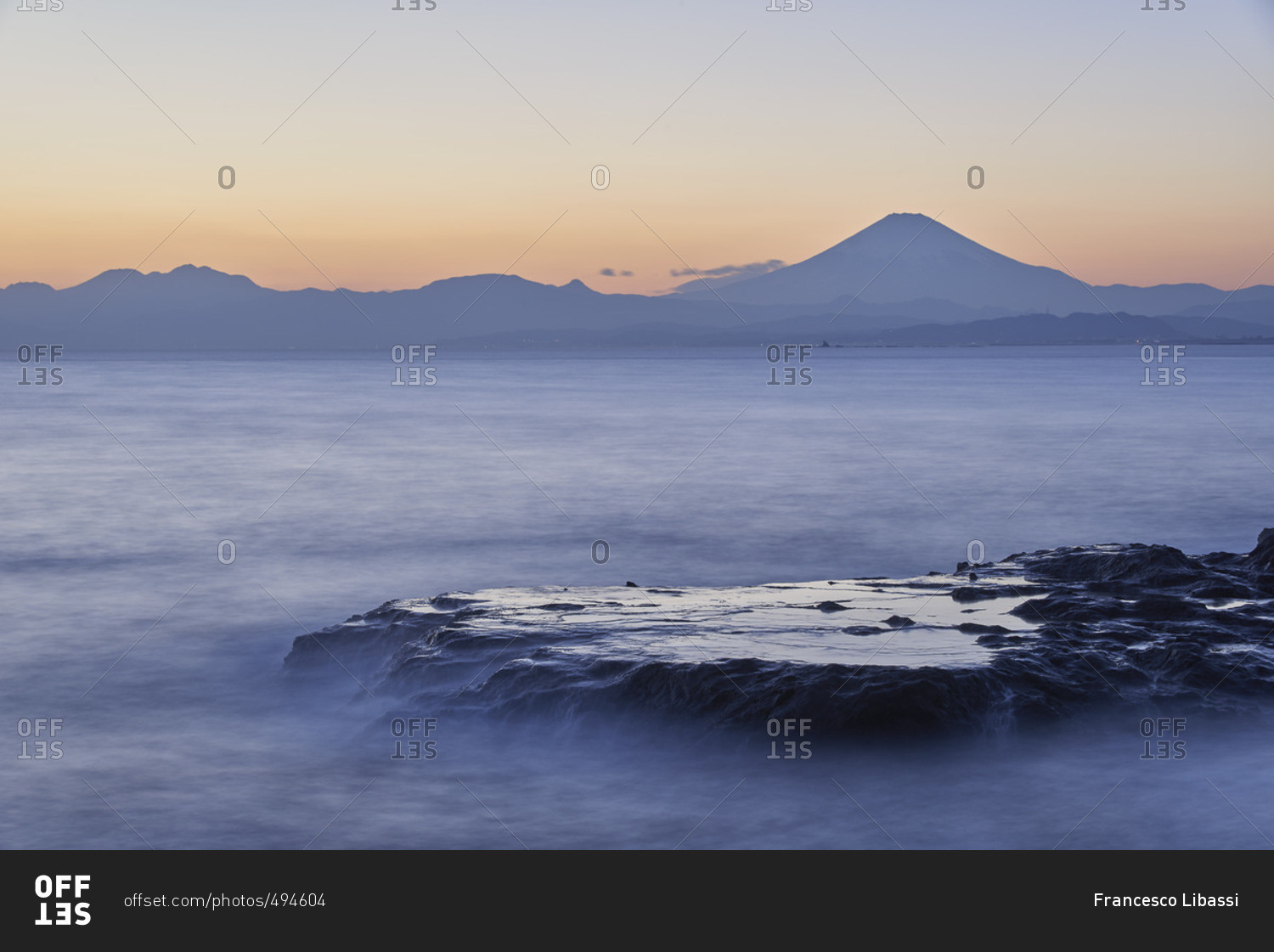 Mount Fuji and silky water after sunset from Enoshima, Kanagawa Prefecture, Japan