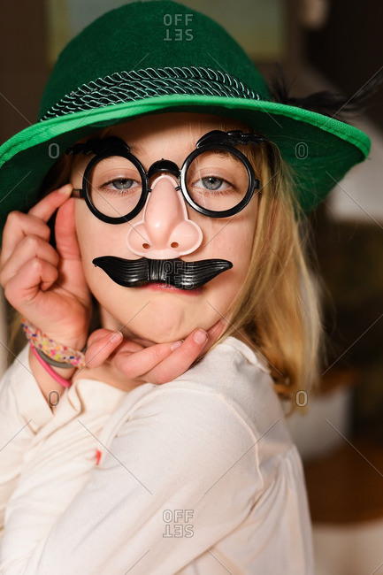 man wearing fake nose and glasses Stock Photo