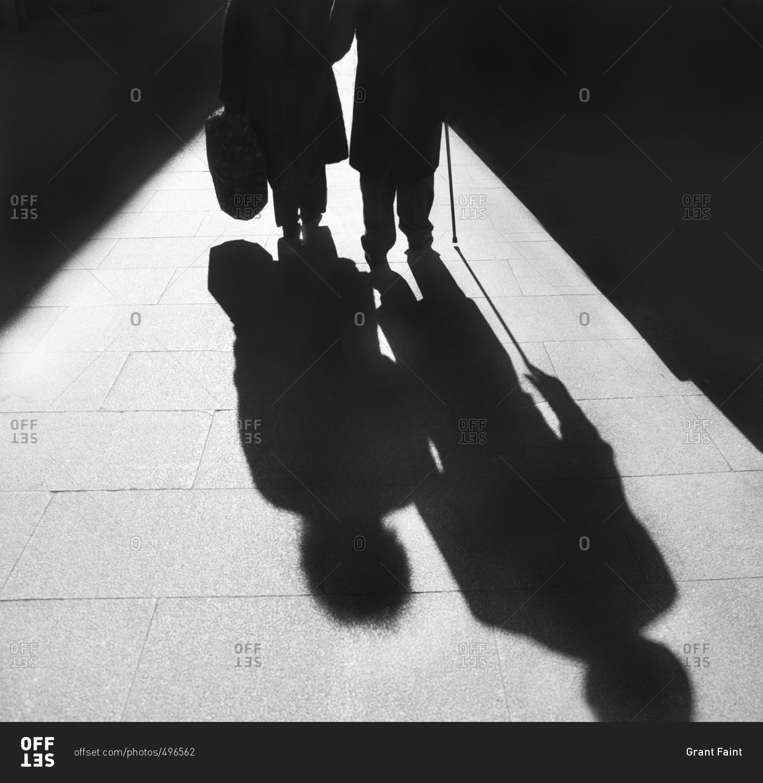 Shadow of older couple walking together