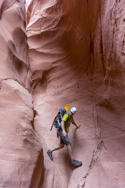 Full length of rock climber walking on mountain