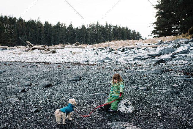 Girl in wilderness with dog