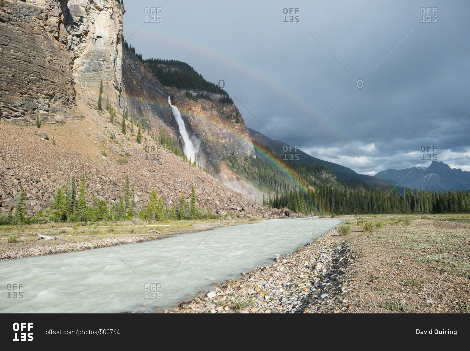 Rainbow beams over Takakkaw Falls in Yoho National Park on a summer day