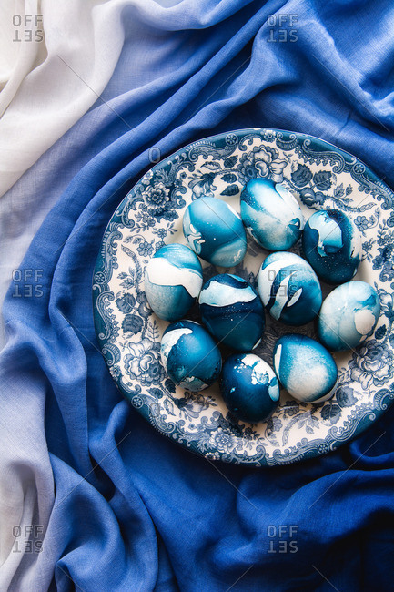 Blue shade nail polish marbled Easter eggs