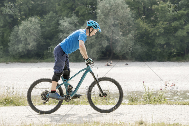 standing on a bike