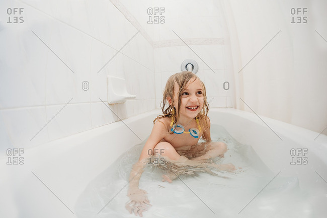 Little Girl Taking A Bath With Goggles, The Girl In The Bathtub