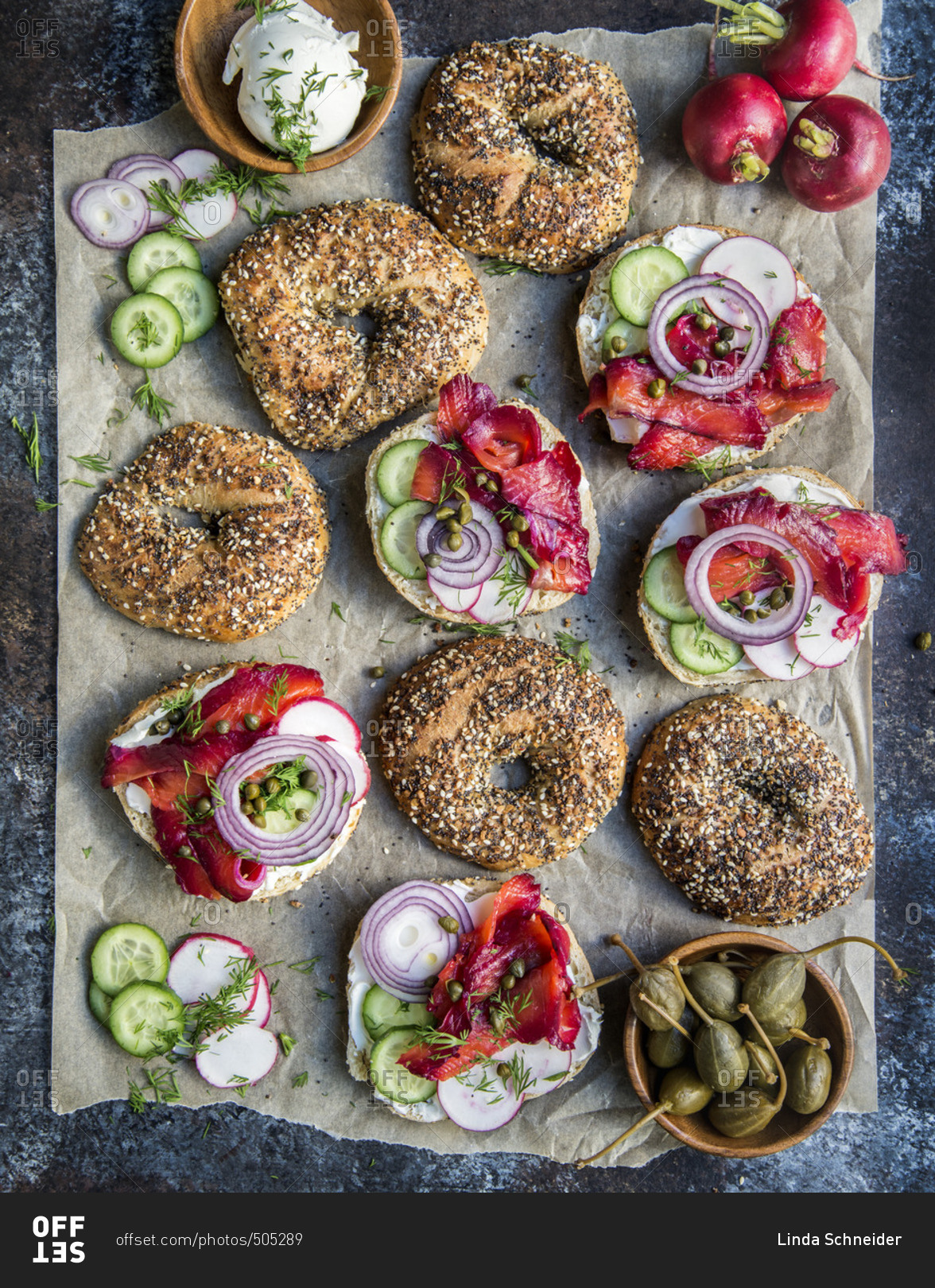 Overhead view of beet cured bagels and lox