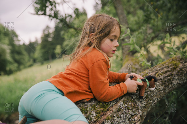 Young Girls Climbing Trees