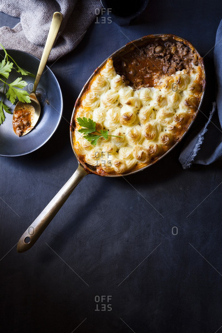 Shepherd's pie or cottage pie is a meat pie with a crust of mashed potato.