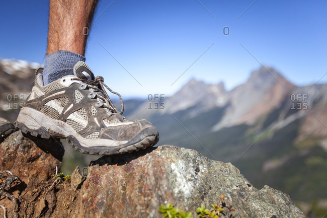 Detail of a lightweight hiking boot on rocky terrain in north cascade national park