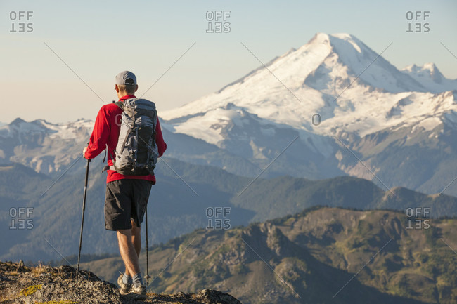Man hiking in north cascades national park with view of mount baker