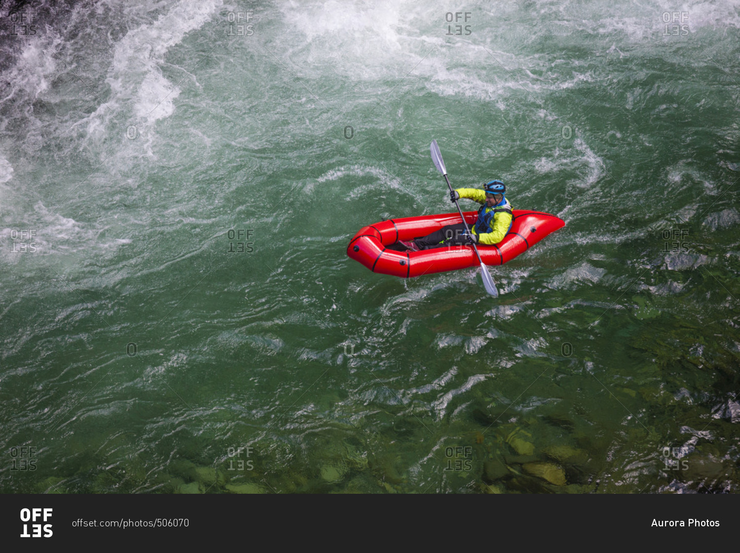 Adam palmer, mountain athlete, navigates a white water section of the Chehalis river on a pack raft