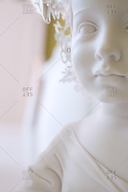 White Figurine Of Child