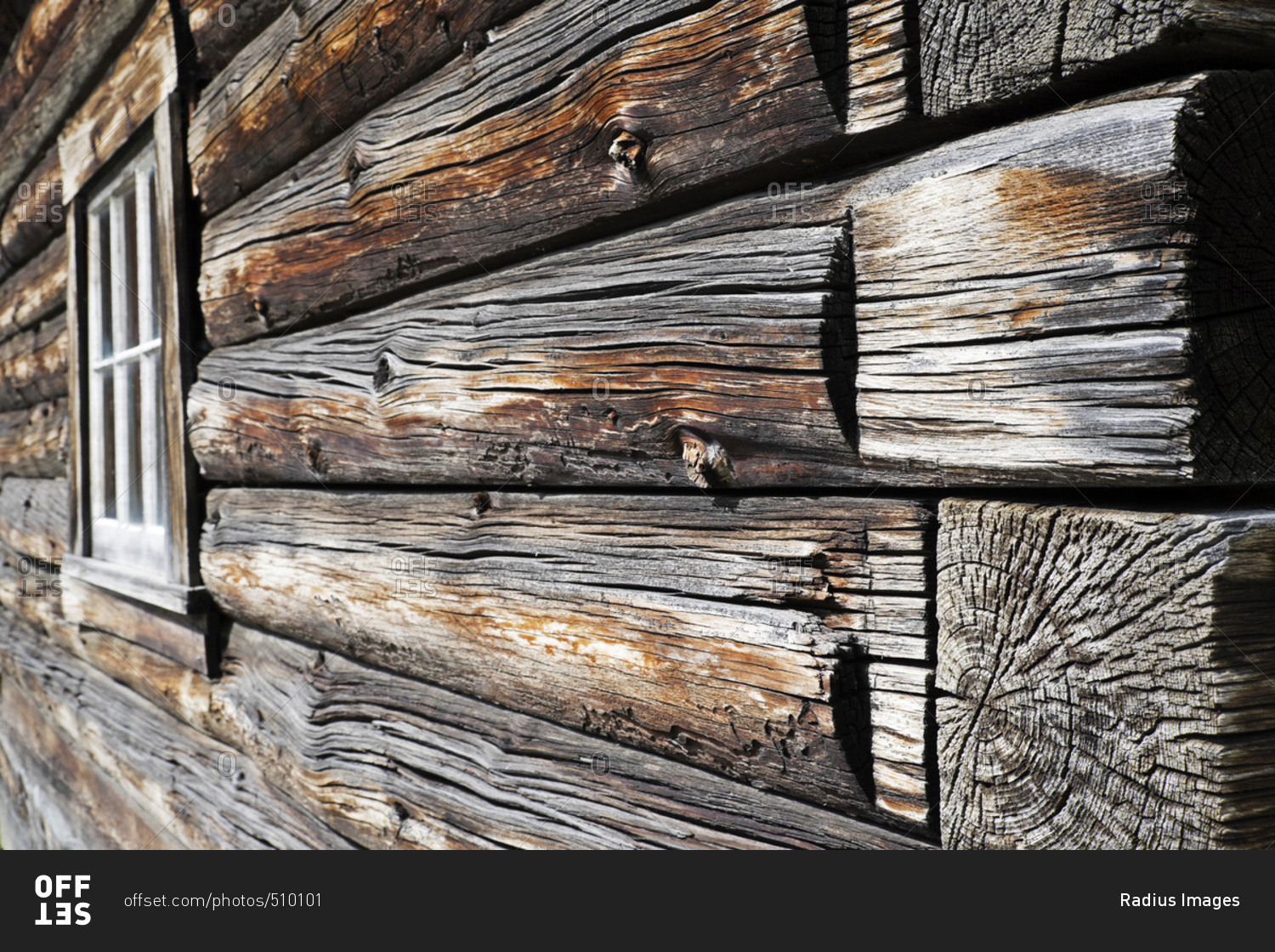 Close-up of weathered logs on traditional wooden building at Baskerville Historic Town in British Columbia, Canada