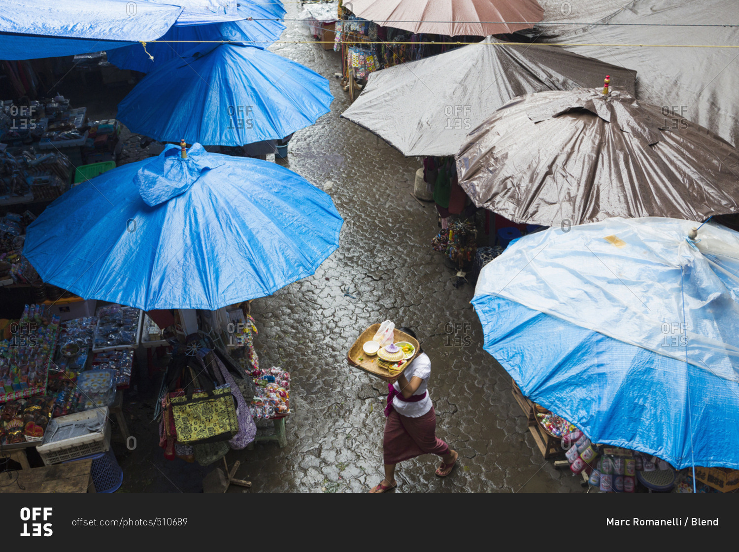 Rain falling over tarps and awnings of market stalls, Ubud, Bali, Indonesia