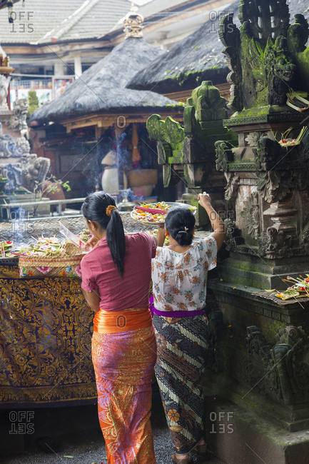 Women preparing Hindu celebration, Ubud, Bali, Indonesia