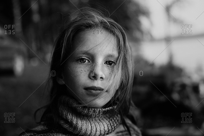 Caucasian girl smiling outdoors - Offset