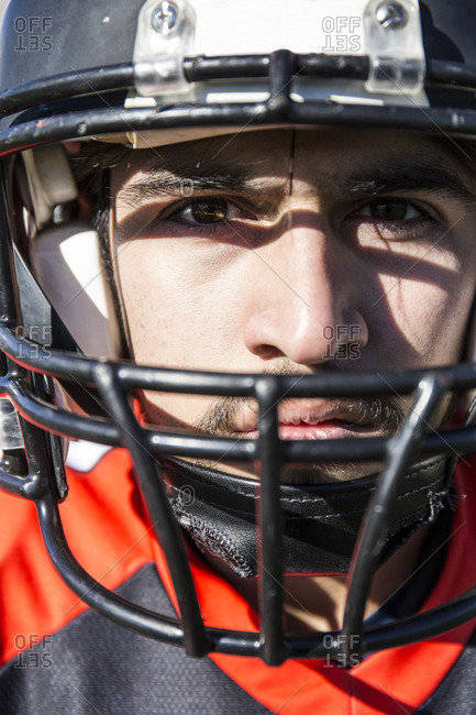 Close Up Portrait Of American Football Player With Helmet Stock Photo Offset