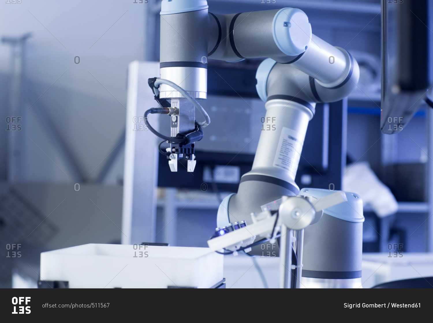 Robot arm in a sensor technology plant