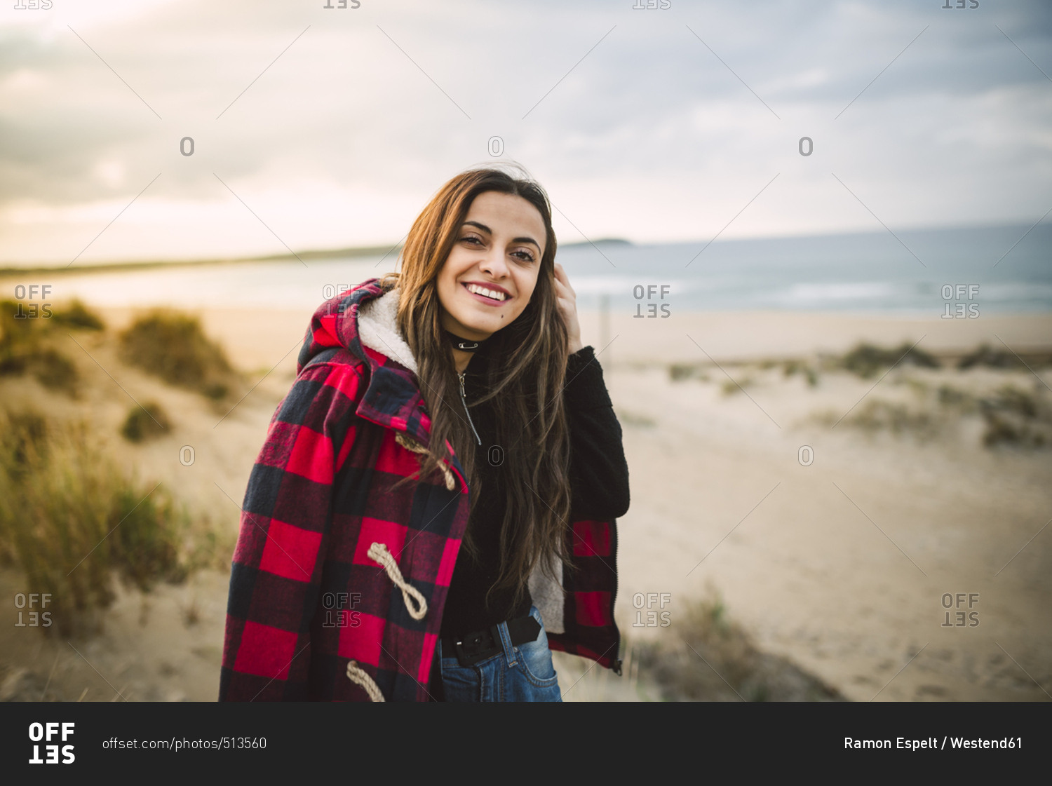 Portrait of relaxed young woman on the beach