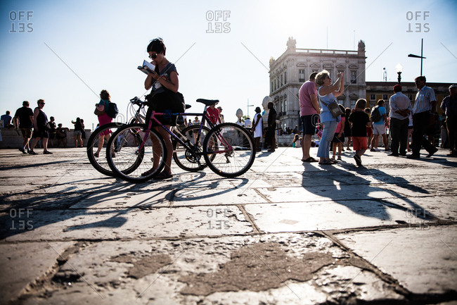 Lisbon, Portugal - July 12, 2014: Tourists and locals in an historical public square in downtown