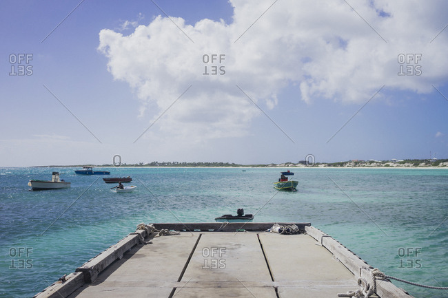 Aguilla - January 16, 2017: Pier over blue water