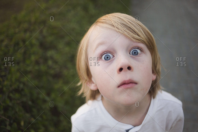 Little Blond Boy Making Scared Face Stock Photo, Picture and