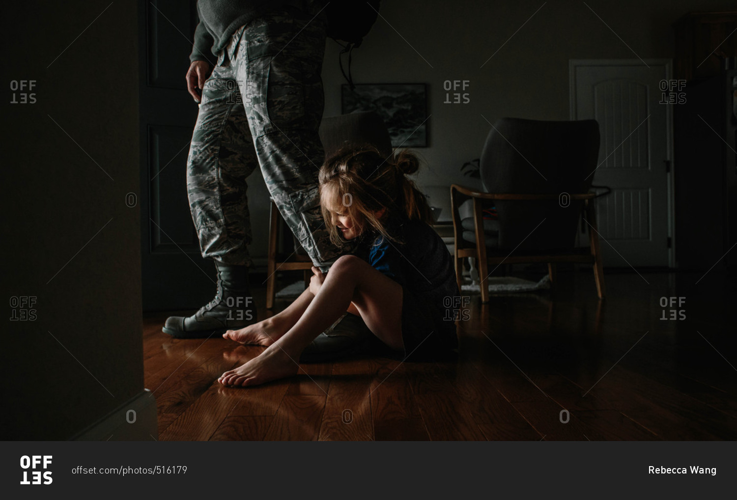 Baby with fathers long legs Stock Photo - Alamy