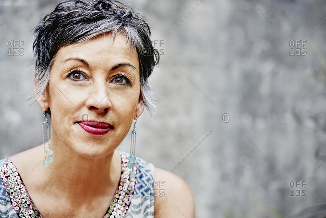 Close up of older Caucasian woman sitting outdoors