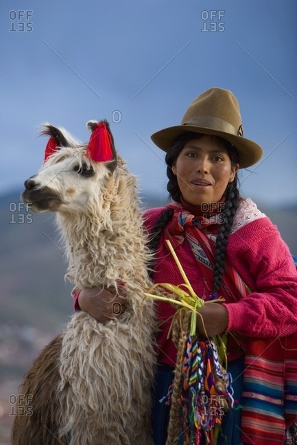 Cuzco, Peru; Peruvian Woman And Her Llama (Lama Glama)