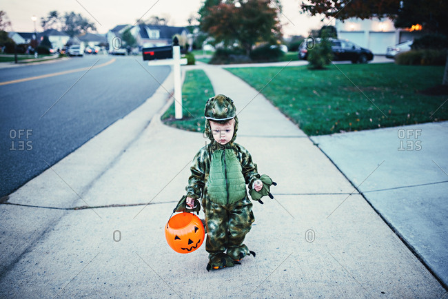 Boy in a dragon costume for Halloween