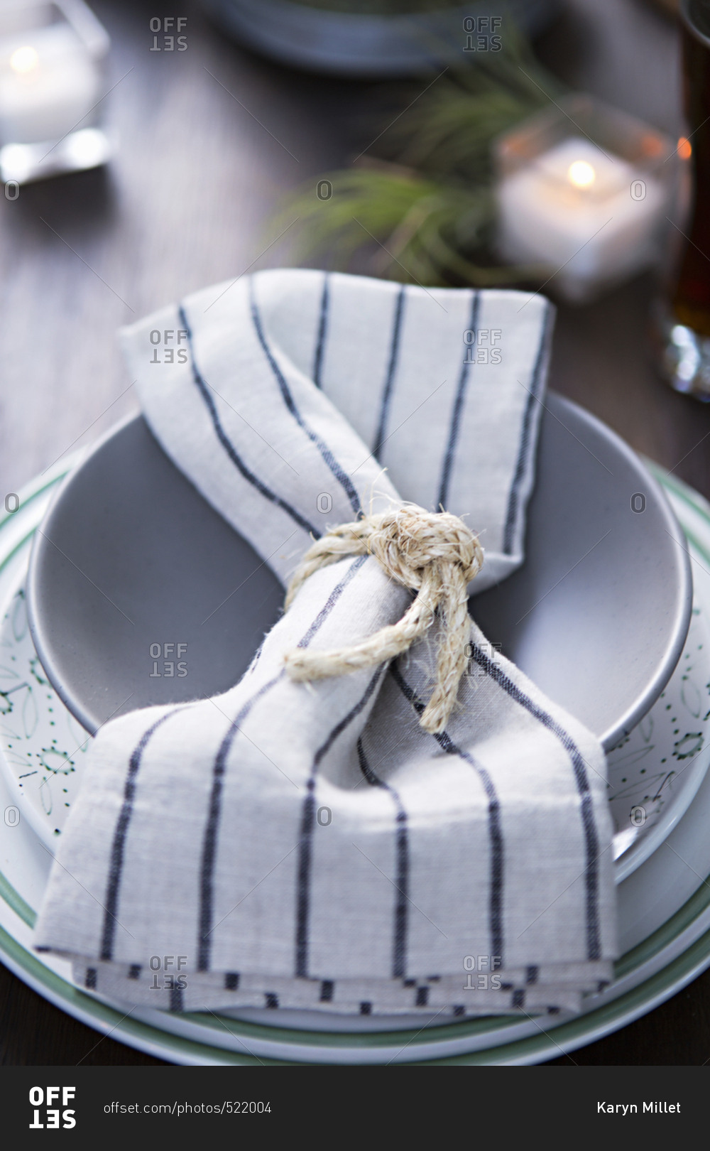 Striped napkin tied with sisal rope
