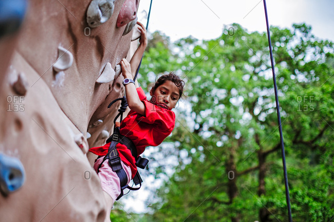 May 30, 2013 - Nainital, Uttarakhand, India: View of woman practicing on climbing wall