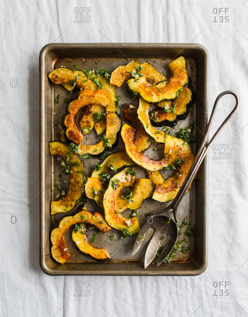 Baked squash slices on pan