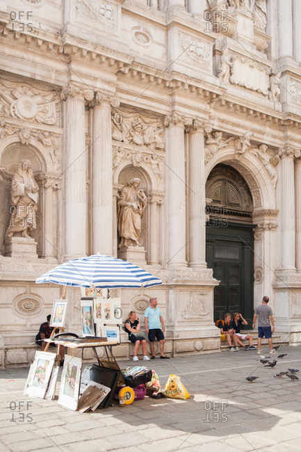 Venice, Italy - July 22, 2015: Stand selling artwork in Venice