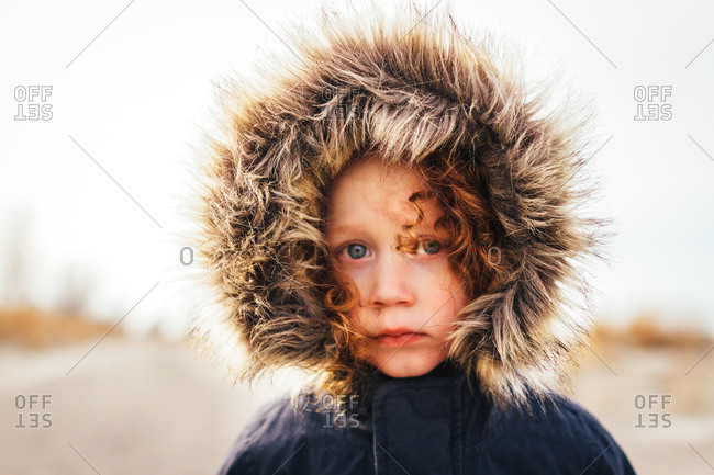 Child in furry hood
