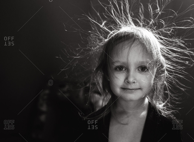 Cute little girl with static charged up hair