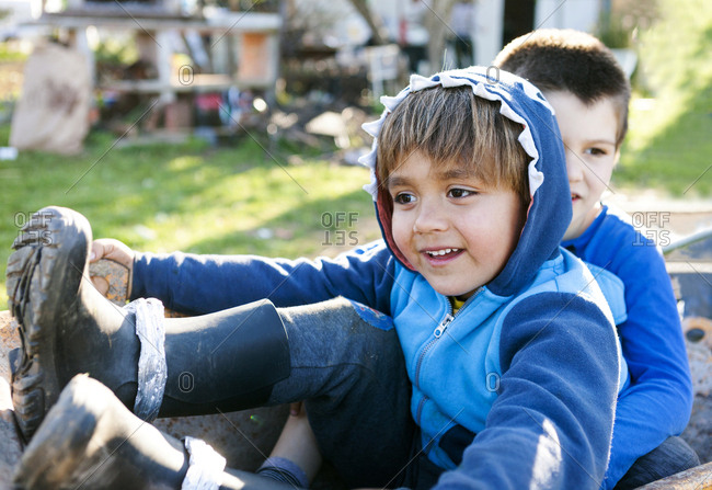 Children playing outdoors on farm