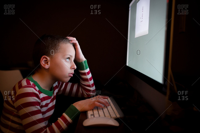 Boy practicing math facts on computer