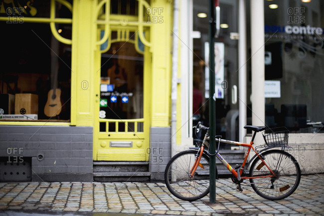 Brussels, Belgium - July 11, 2014: Bike parked by shops