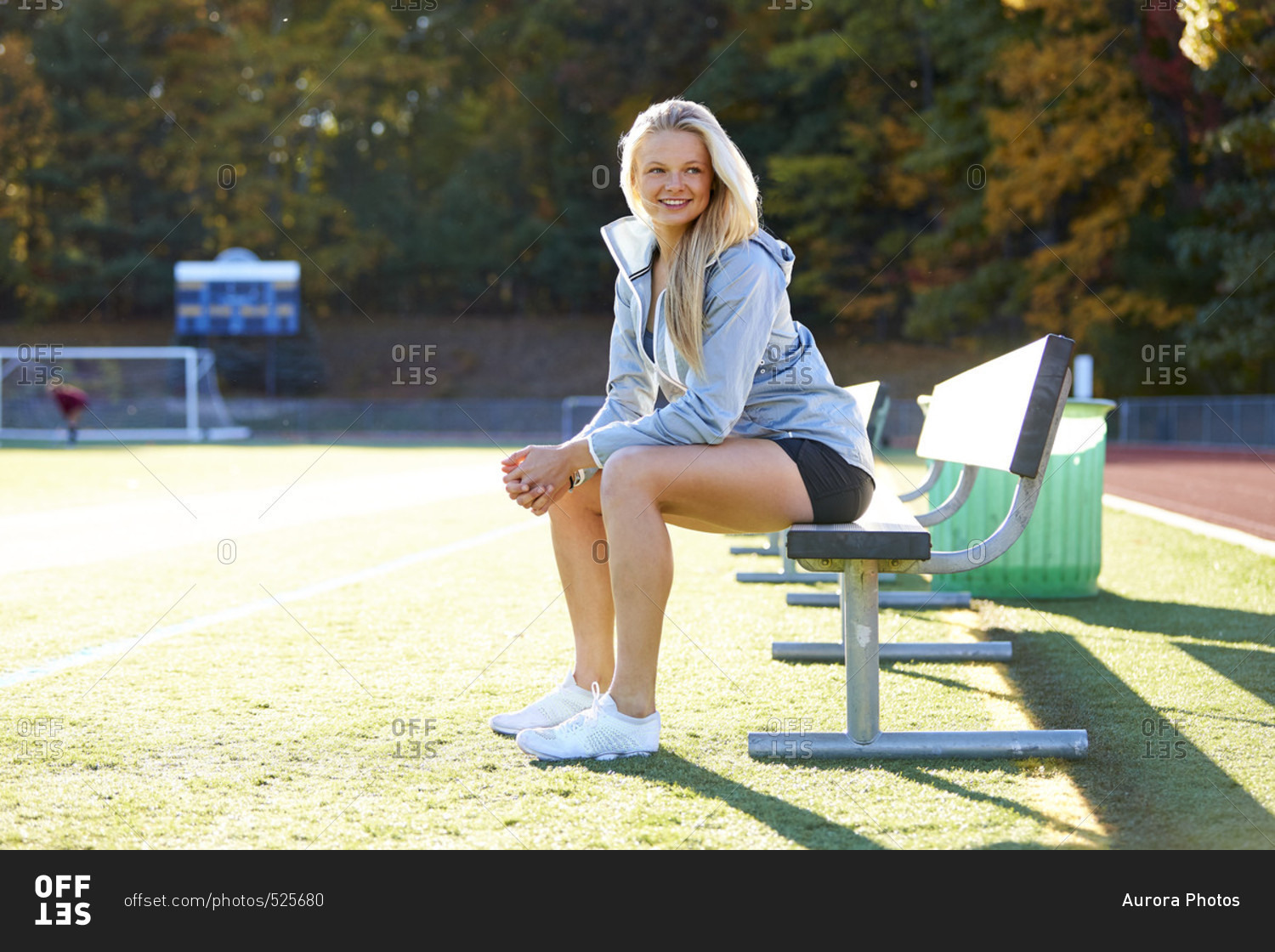 Preggy female sitting upskirt on the city park bench