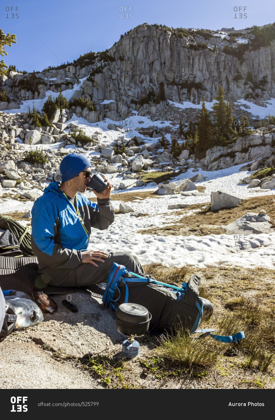 A Man Cooks Breakfast And Enjoys His Coffee While Camping In The Lone Peak Wilderness In Utah's Wasatch Mountains