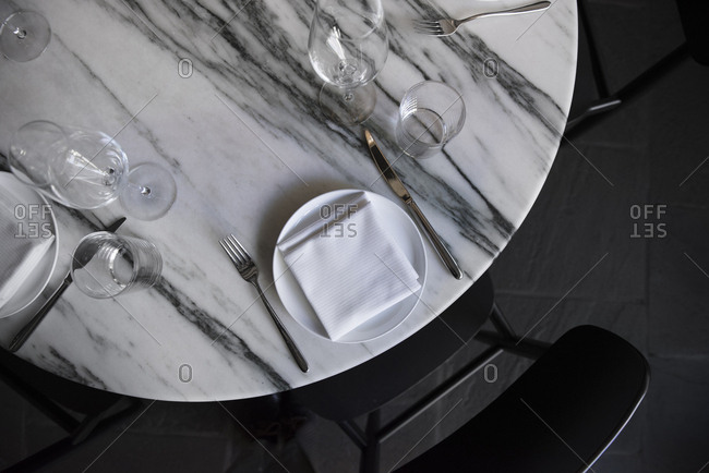 Marble table set for dinner