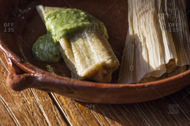 Fava Beans tamales and green sauce