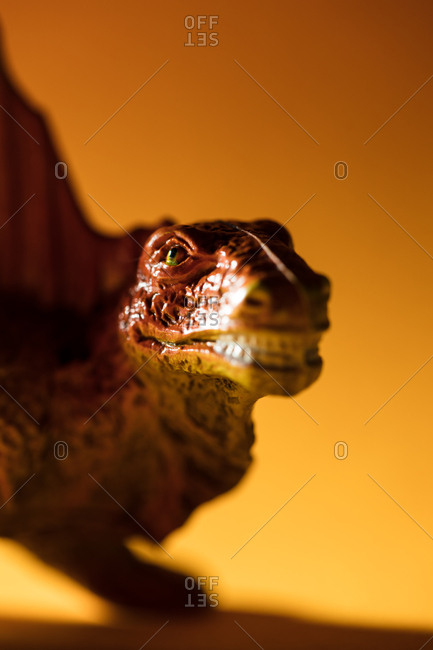 Close-up of the a toy Dimetrodon dinosaur's face