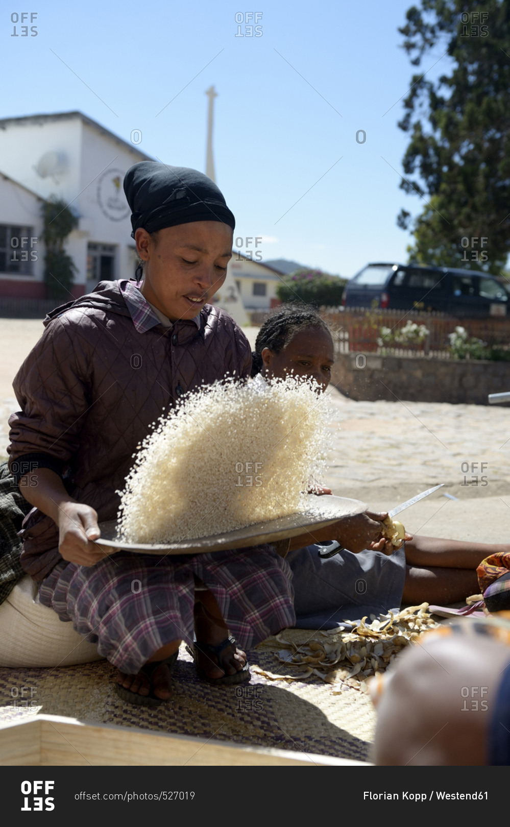 Madagascar- Fianarantsoa- Woman in school kitchen preparing school meals