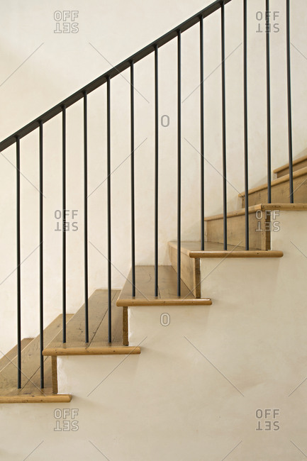 Staircase with minimalist spindles and railing